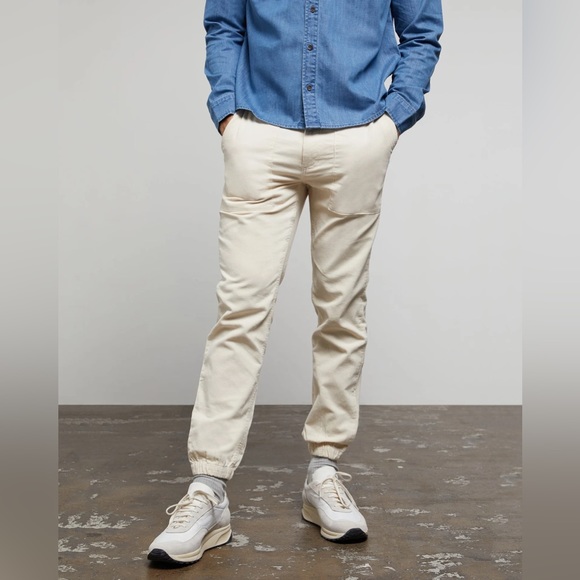 The onia corduroy jogger has flat front with zipper and drawcord waist. In Swan - Picture 3 of 4